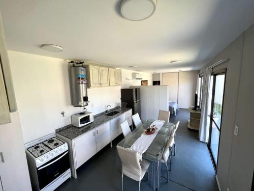 A kitchen or kitchenette at Terraverde Apartment