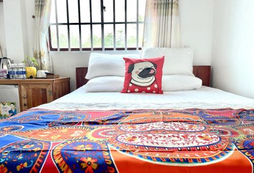 سرير أو أسرّة في غرفة في Van's House Ong Lang Beach, Phu Quoc