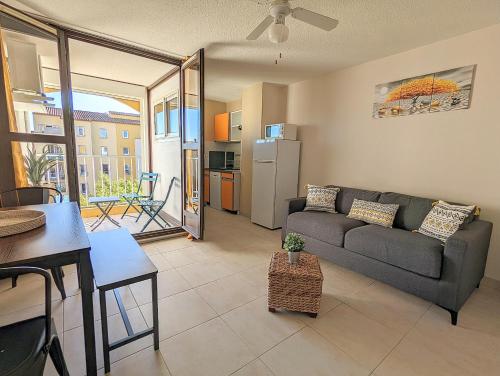 Posedenie v ubytovaní Appartement avec CLIMATISATION, proche golf et île des loisirs