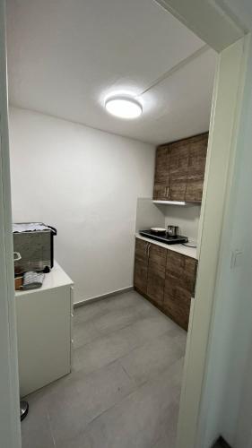 Kuchyň nebo kuchyňský kout v ubytování Monteurzimmer Ringingen