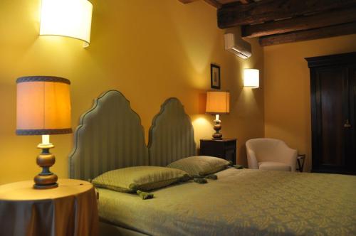 Postel nebo postele na pokoji v ubytování Piazza Nova Guest House