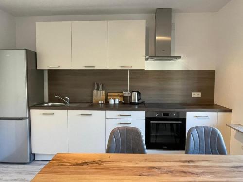 Una cocina o kitchenette en Gemütliche 3Zi Ferienwohnung