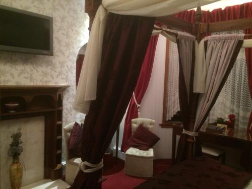 A television and/or entertainment center at 6 Caberfeidh( Blue House ) 