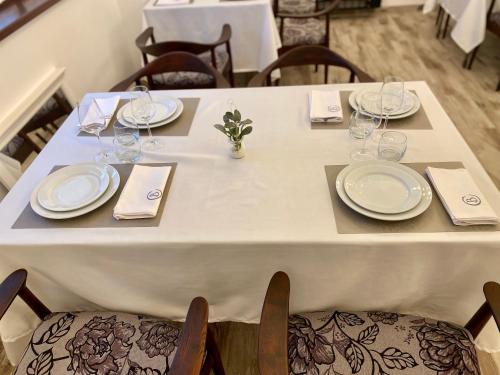 Pensiunea Charlotte Boutiqueにあるレストランまたは飲食店