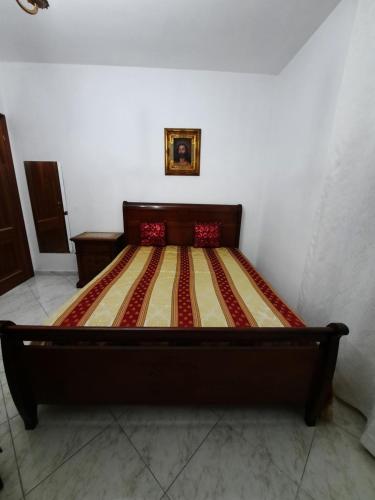 Ένα ή περισσότερα κρεβάτια σε δωμάτιο στο Luna Reale Relais e Suite
