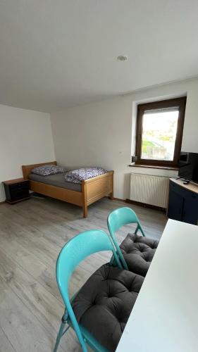Postel nebo postele na pokoji v ubytování Monteurzimmer Ringingen