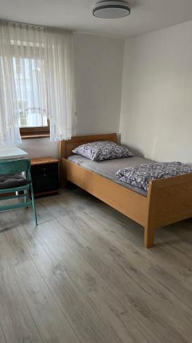Postel nebo postele na pokoji v ubytování Monteurzimmer Ringingen