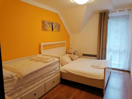 Kamzík Donovaly apartmány a štúdiáにあるベッド