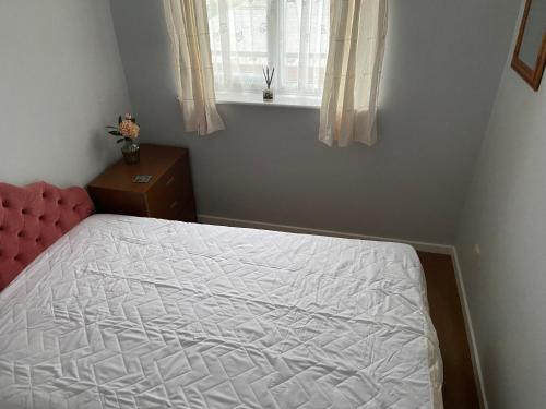 Ένα ή περισσότερα κρεβάτια σε δωμάτιο στο 3 Bedroom House With Balcony Close To Beach