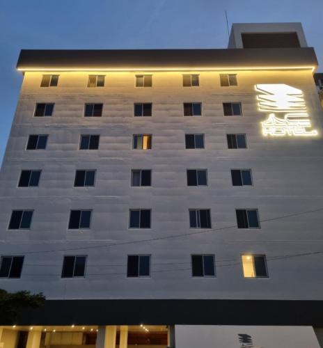 a building with a sign on the side of it at Sodo Hotel Paju in Paju
