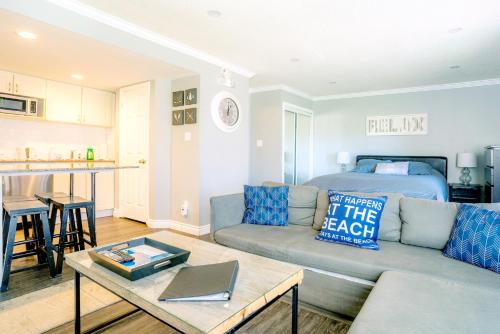 a living room with a couch and a bed at Updated Blue Mountain Studio @ North Creek Resort in Blue Mountains