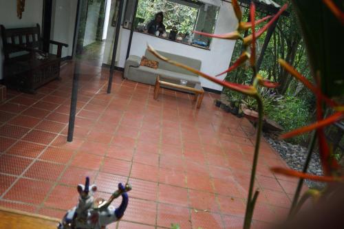 a view of a living room with a couch at Skale Peregrino in Choachí