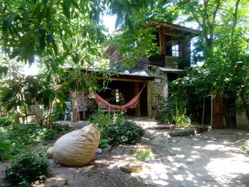 a house with a large sack in front of it at Casa Marindia una cuadra playa in Salinas