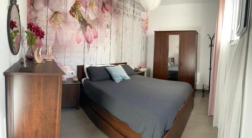 Posteľ alebo postele v izbe v ubytovaní Hope's ático-apartamento
