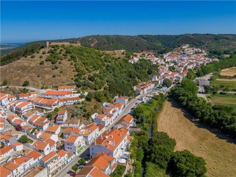an aerial view of a town with orange roofs at Beach House Haller in Aljezur