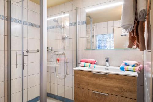 a bathroom with a shower and a sink at Bauernhof Lehengut in Pfarrwerfen