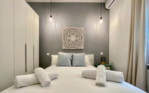 A bed or beds in a room at La Latina Market - Apartamento de 2 dormitorios