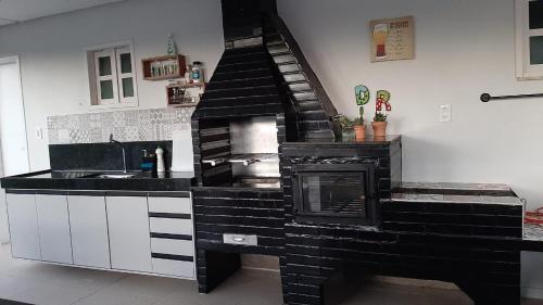 Dapur atau dapur kecil di Ampla Casa de Veraneio
