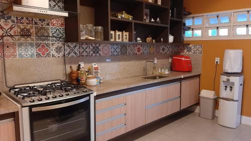 Dapur atau dapur kecil di Ampla Casa de Veraneio