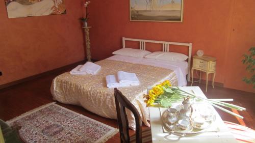 Postel nebo postele na pokoji v ubytování San Quintino B&B