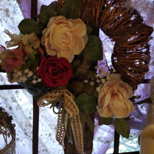 a bouquet of roses and other flowers in a vase at Filoxenia- Drakia in Drakeia