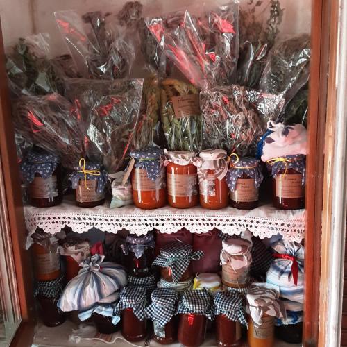 a closet filled with lots of different types of shoes at Filoxenia- Drakia in Drakeia