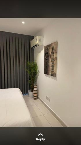 Postel nebo postele na pokoji v ubytování Haven Apartment