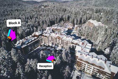 an aerial view of a resort with the words block a revision and reception at Pinewood ANG luxurious apartment A43, Borovets Gardens in Borovets
