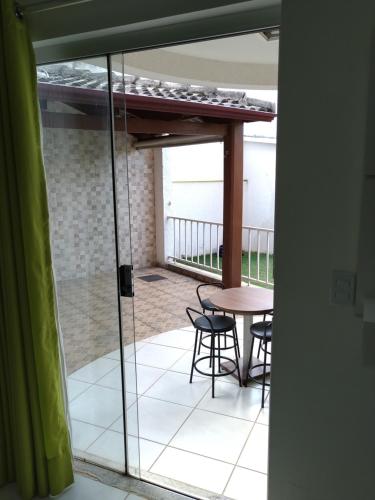 Balkón nebo terasa v ubytování AP do LAGO, com Churrasqueira privativa , cozinha , internet no ap, rampa barco e jet, pesqueiro - B101