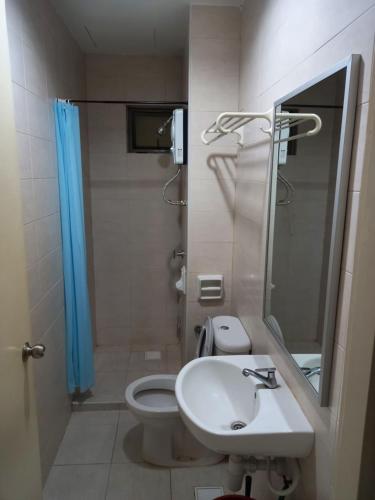 a bathroom with a sink and a toilet and a shower at HOT!!!Tropics Homestay Private Male Dorm Damansara in Petaling Jaya