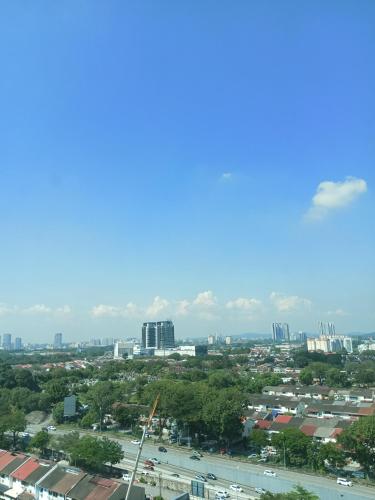 a view of a city from the top of a building at HOT!!!Tropics Homestay Private Male Dorm Damansara in Petaling Jaya