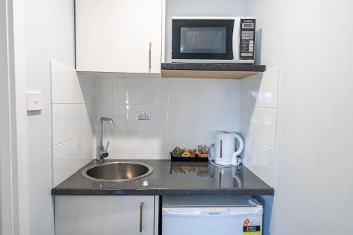 Dapur atau dapur kecil di Bega Motel