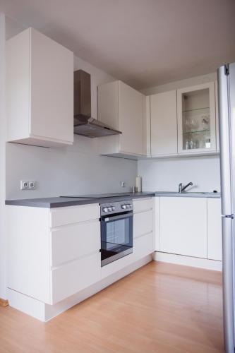 Zimmer & Appartements in der Gamlitzerstrasseにあるキッチンまたは簡易キッチン