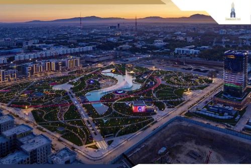 an aerial view of a city at night at Covent Garden in Tashkent
