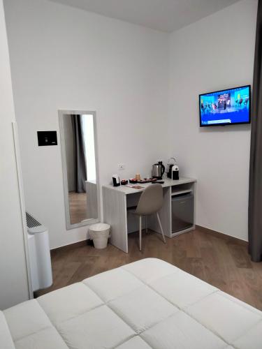 Μια τηλεόραση ή/και κέντρο ψυχαγωγίας στο THE BEST SUITES & ROOMS - A pochi passi dalla kasbah -