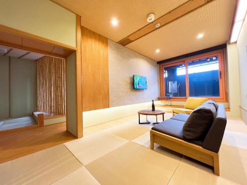 Posezení v ubytování OWL RESORT ARIFUKU ONSEN
