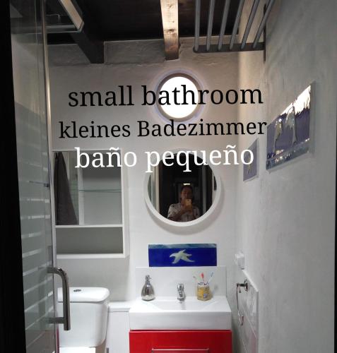a bathroom with a small bathroom heinemann bathroomennaenna baro peoria at ALOELUX VILLA !! - Private Villa with POOL , jacuzzi, cinema, massage ,wonderful view, art desing villa in Tías