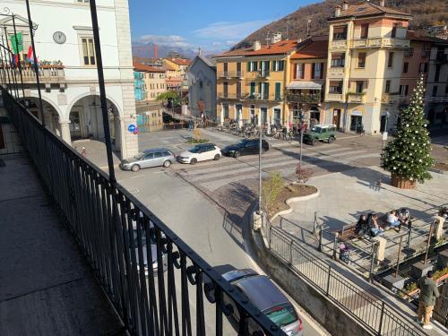 a view of a city with a train on a street at Casavacanze IL GALLO in Omegna