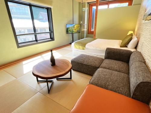 Posezení v ubytování OWL RESORT ARIFUKU ONSEN