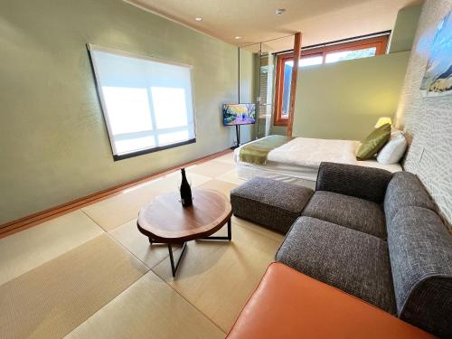 Posezení v ubytování OWL RESORT ARIFUKU ONSEN