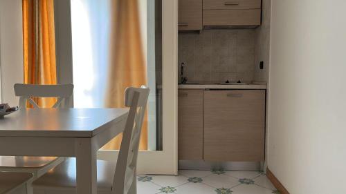 Η κουζίνα ή μικρή κουζίνα στο Gatto Bianco le Dimore