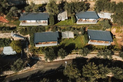 an overhead view of a row of houses with roofs at Agriturismo Rose di Pietra in Pietra Ligure