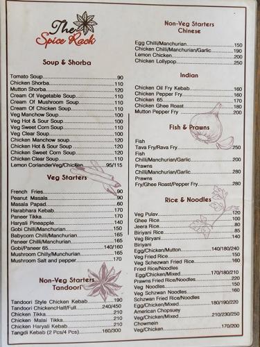 a page of a menu for a restaurant at The Cocoon in Gonikoppal