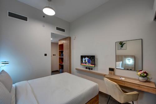 TV a/nebo společenská místnost v ubytování Wescott Hotel