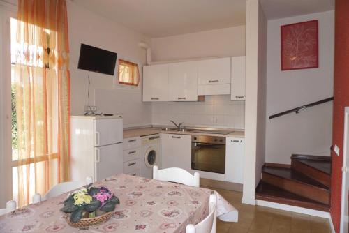 Kép Homely villa with private garden and shared pool szállásáról Porto Santa Margherita di Caorléban a galériában