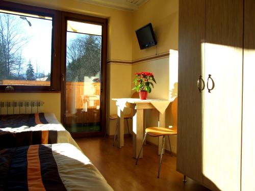 Postel nebo postele na pokoji v ubytování Homestay Srebrny Potok