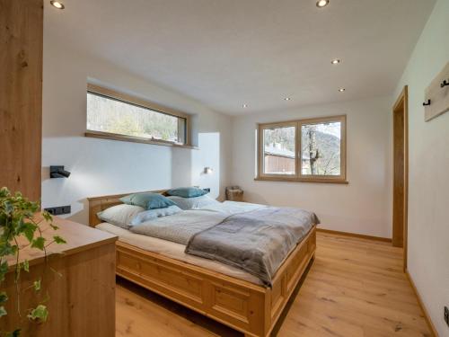 A bed or beds in a room at Ferienwohnung Bergliebe