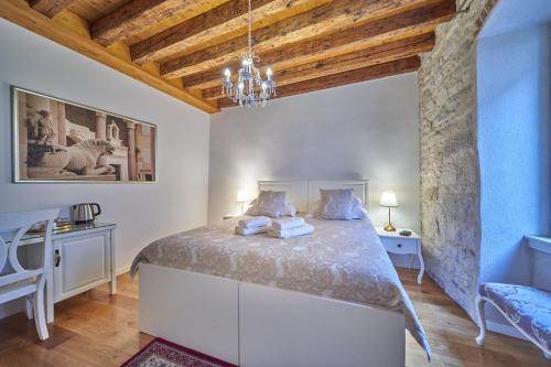 Letto o letti in una camera di Villa Split Heritage Hotel