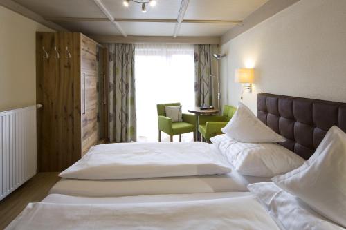Katil atau katil-katil dalam bilik di Hotel Gasthof Obermair