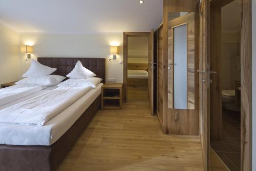 Katil atau katil-katil dalam bilik di Hotel Gasthof Obermair